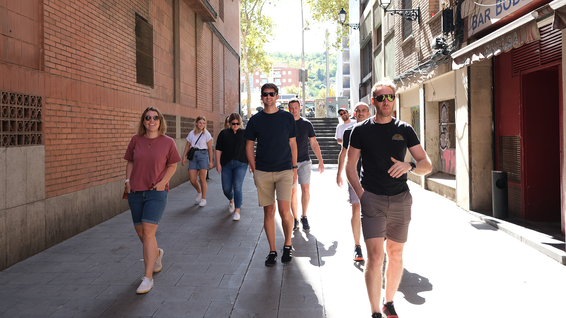 The Canopy Studio team walking down a street in Barcelona